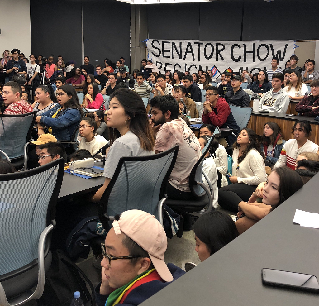 Students With a banner for Chow's resignation